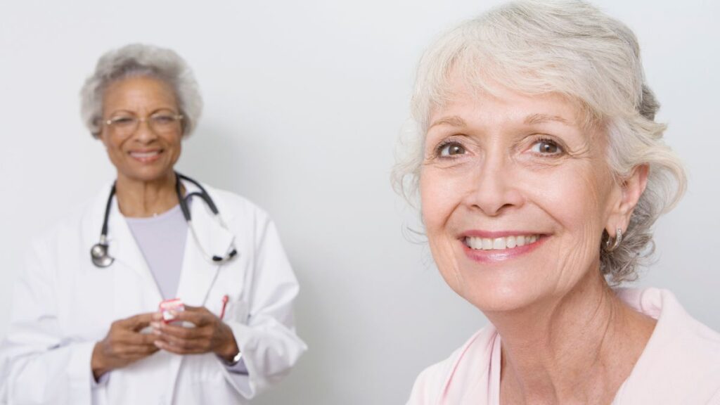 older woman with doctor